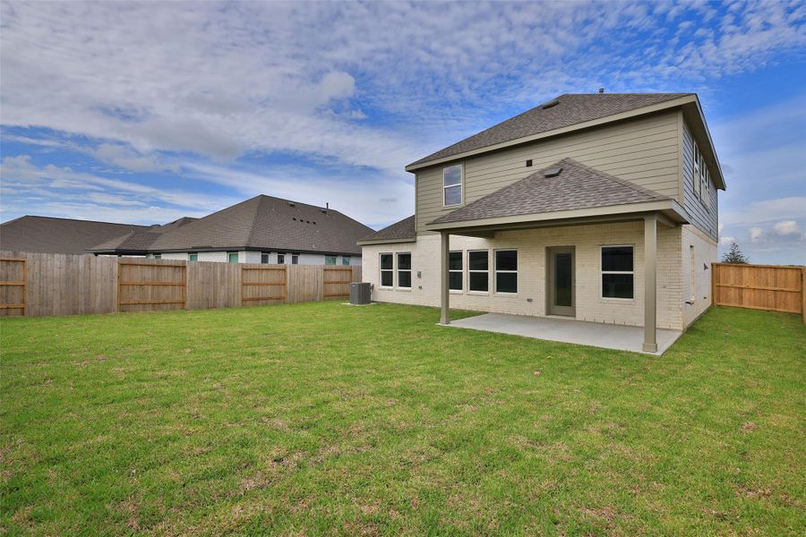 Exterior details and patio area of a home in River Ranch, Dayton (Image 3).