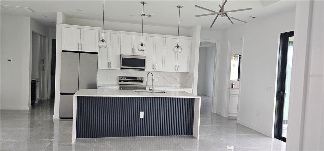 Furnished interior view inside a new home in , Cape Coral (Image 5). Furnished interior view inside a new home in , Cape Coral (Image 5).