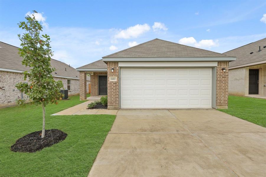 Exterior details and patio area of a home in Christian Meadows, Ennis (Image 2).