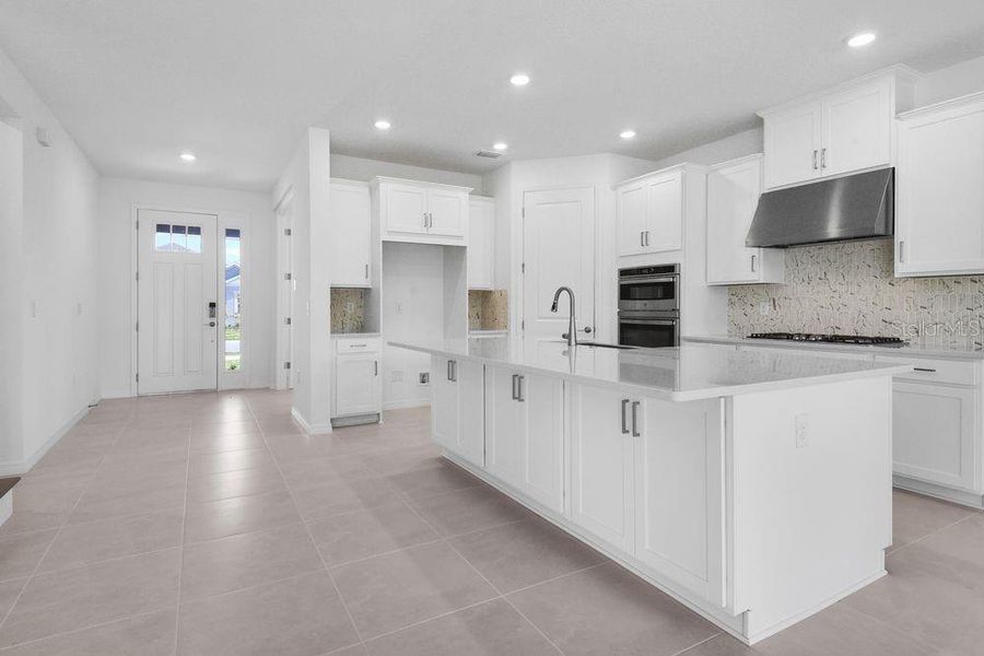 Furnished interior view inside a new home in Ardisia Park, New Smyrna Beach (Image 7).