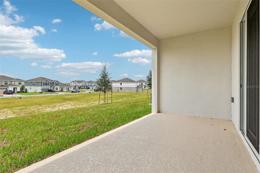 Exterior details and patio area of a home in Trinity Lakes, Groveland (Image 4).