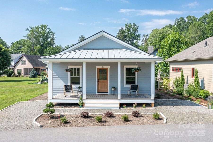 Experience eco-conscious living at its finest in this NC Green Built Certified home within the gated community of The Villages of Crest Mountain.