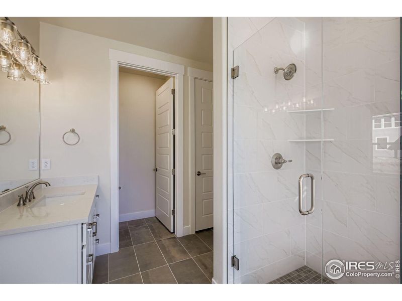 Furnished interior view inside a new home in RainDance National 60/70, Windsor (Image 11).