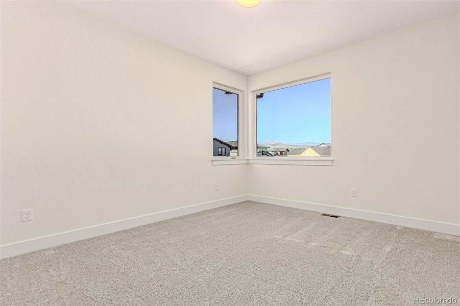 Spacious, unfurnished interior of a new home in West Grange, Longmont (Image 28).