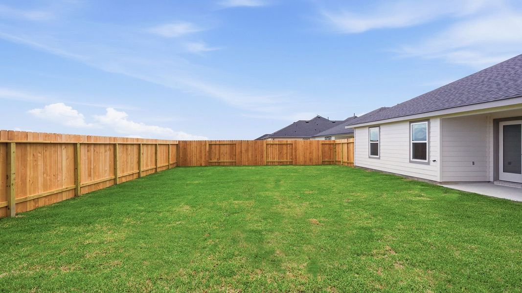 Exterior details and patio area of a home in Highland Village, Nome (Image 3).