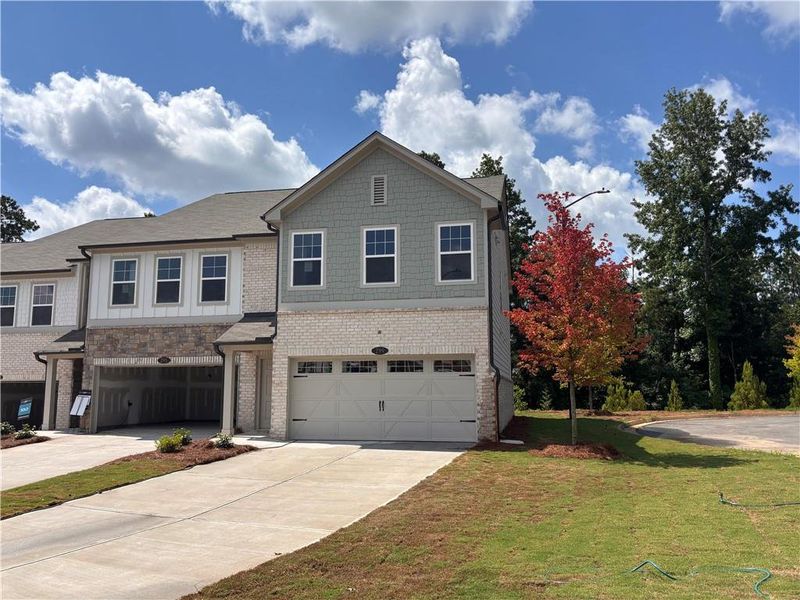 Front exterior of a new home in Leydenview, Mableton, GA, highlighting curb appeal (Image 25).