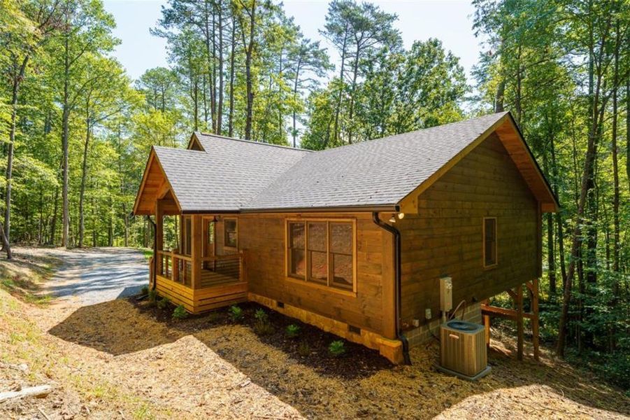 Exterior details and patio area of a home in , Cherry Log (Image 19).