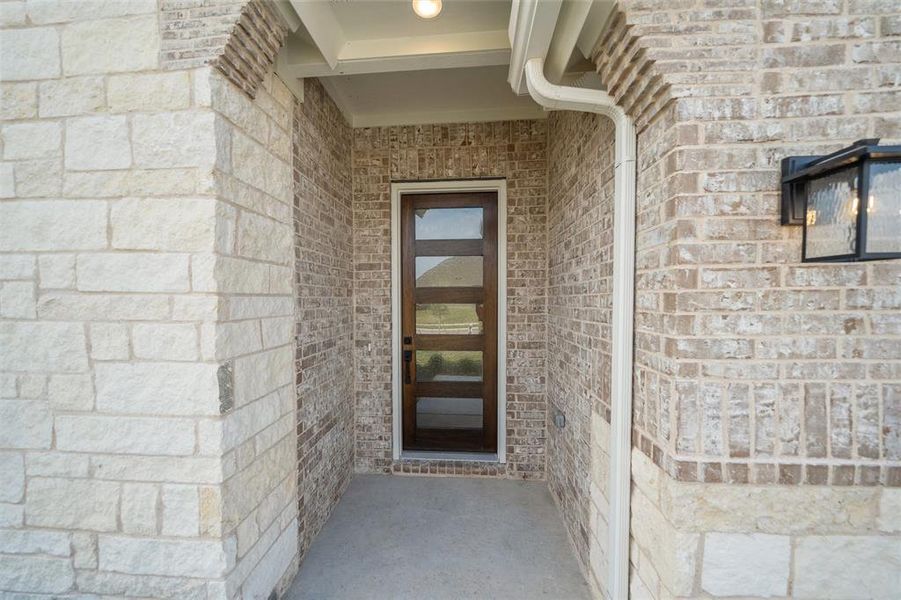 Exterior details and patio area of a home in Morningstar, Aledo (Image 21). Exterior details and patio area of a home in Morningstar, Aledo (Image 21).