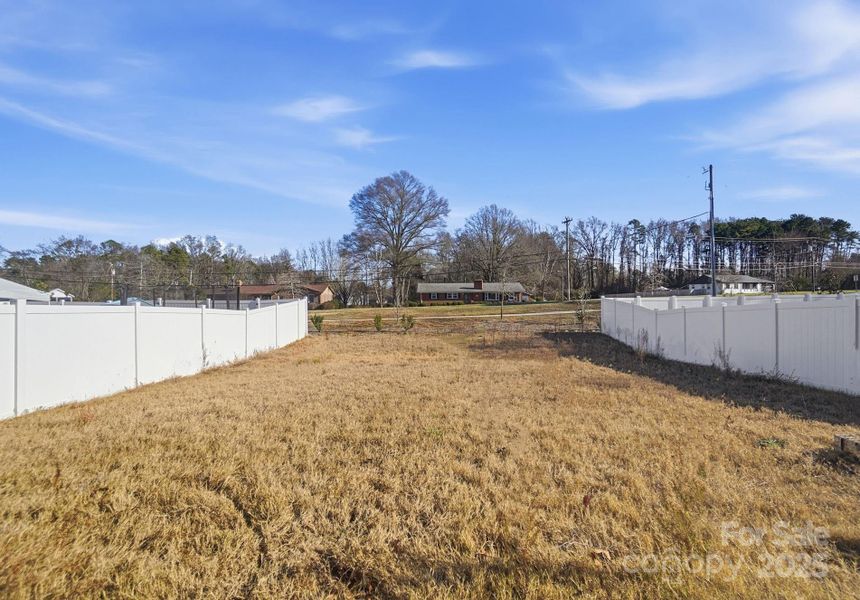 Exterior details and patio area of a home in , Charlotte (Image 3). Exterior details and patio area of a home in , Charlotte (Image 3).