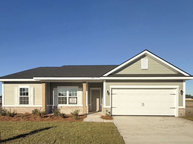 Front exterior of a new home in The Village at Sassafras, Allenhurst, GA, highlighting curb appeal (Image 1).
