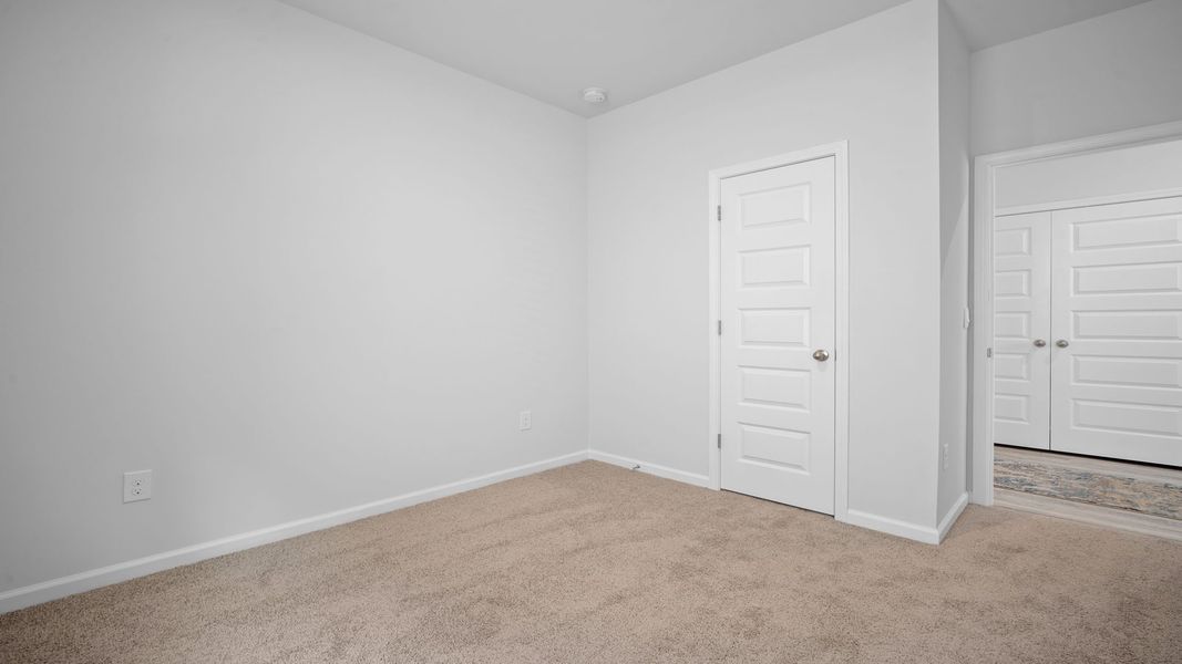 Spacious, unfurnished interior of a new home in The Lakes at North Glynn, Brunswick (Image 19).