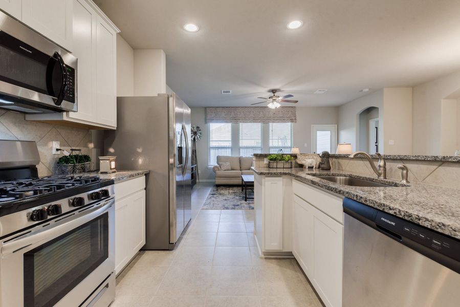 Representative furnished interior of a home built from the Floor Plan 1759 by Colina Homes in Grand Magnolia, Magnolia (Image 8). Representative furnished interior of a home built from the Floor Plan 1759 by Colina Homes in Grand Magnolia, Magnolia (Image 8).