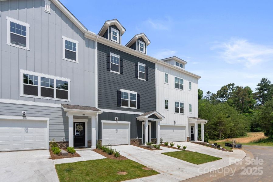 Front exterior of a new home in , Asheville, NC, highlighting curb appeal (Image 17).