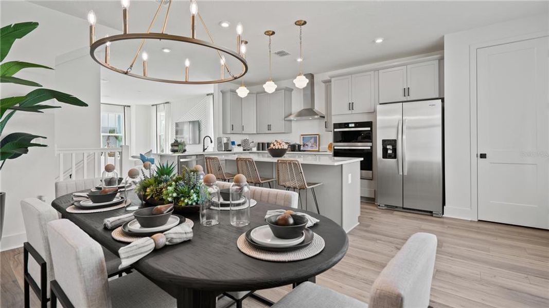 Furnished interior view inside a new home in Parkview at Hamlin, Winter Garden (Image 33).