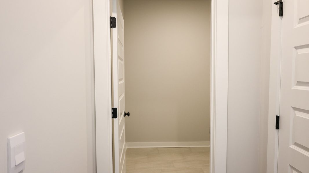 Representative unfurnished interior of a home built from the EMBRY by D.R. Horton in Harvest Point, Spring Hill (Image 27).