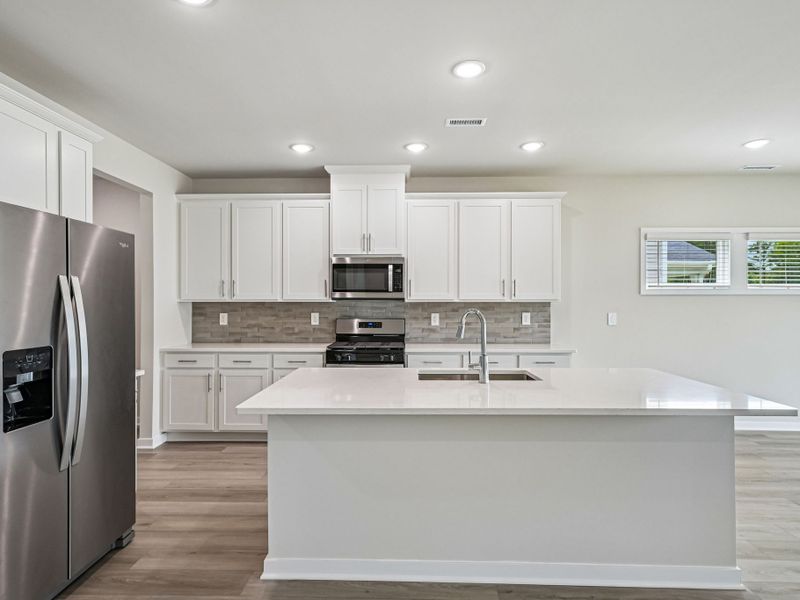 Furnished interior view inside a new home in Avalon Place - Signature Series, Durham (Image 4).