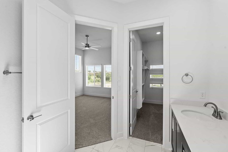 Furnished interior view inside a new home in Centero at Stone Oak, San Antonio (Image 10).