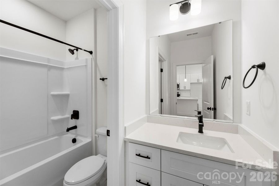 Representative Photo: Guest Bathroom Representative Photo: Guest Bathroom