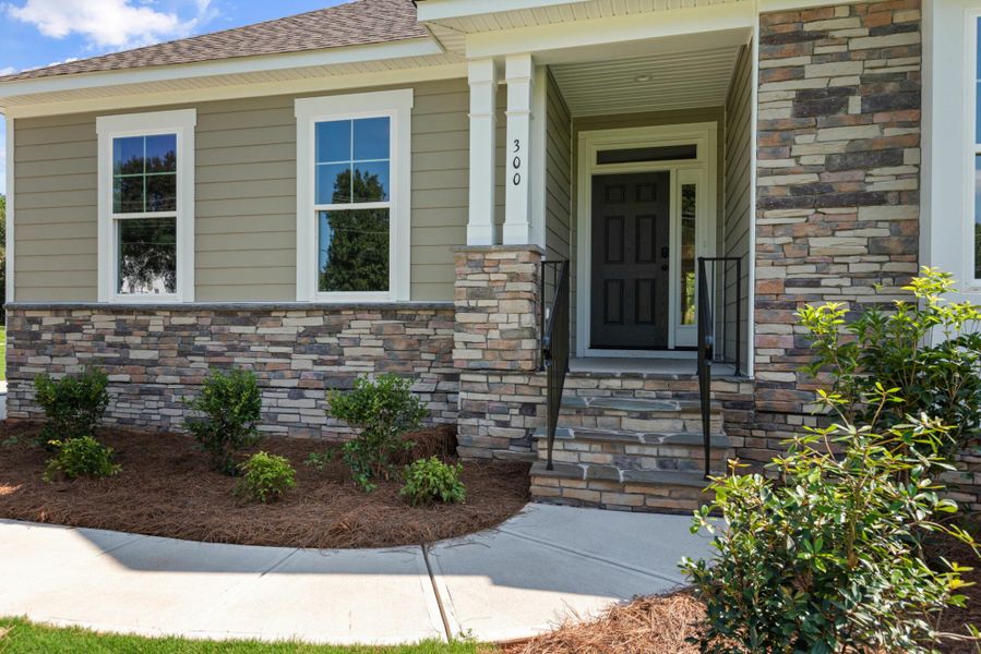 Front exterior of a new home in Redland, Advance, NC, highlighting curb appeal (Image 20). Front exterior of a new home in Redland, Advance, NC, highlighting curb appeal (Image 20).