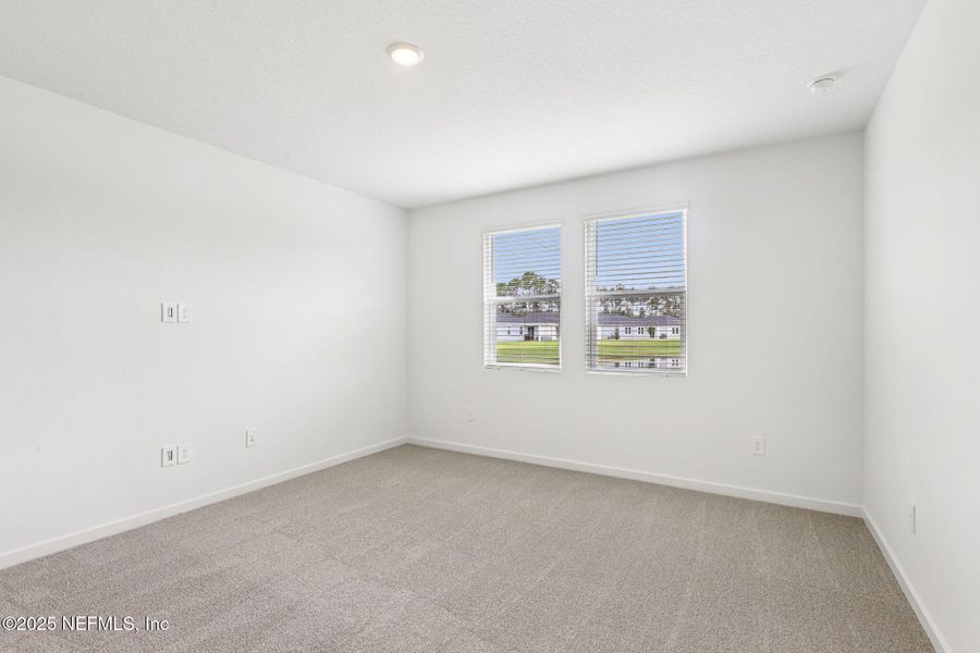 Spacious, unfurnished interior of a new home in Lakes at Bella Lago - Signature Series, Green Cove Springs (Image 27).