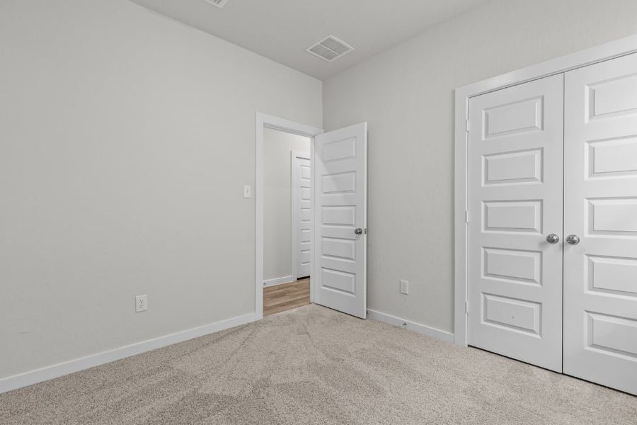 A room with white doors.