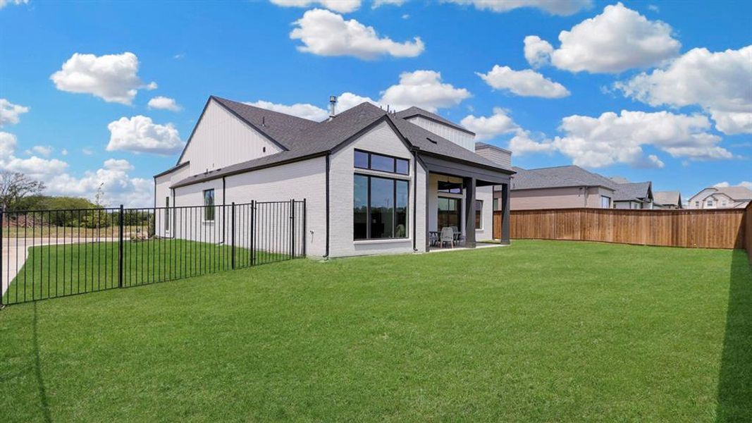 Exterior details and patio area of a home in Rio Vista at Kelly Ranch, Aledo (Image 21).