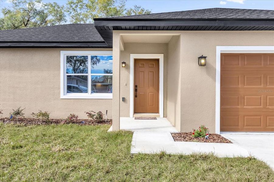 Exterior details and patio area of a home in , Summerfield (Image 13).