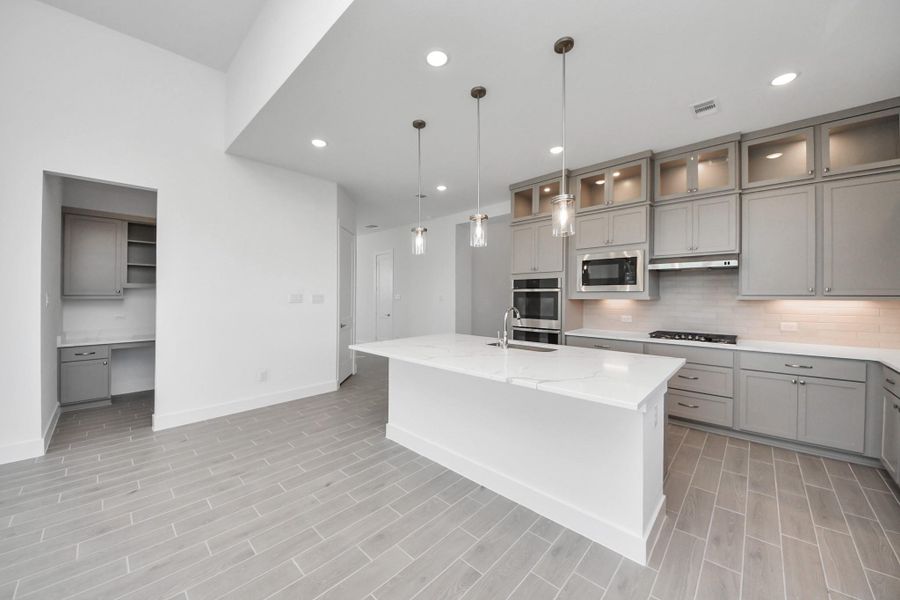 Furnished interior view inside a new home in Meridiana, Manvel (Image 17).