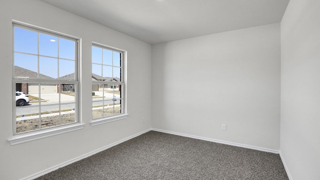 Spacious, unfurnished interior of a new home in Stonewyck Farms, Ennis (Image 11).