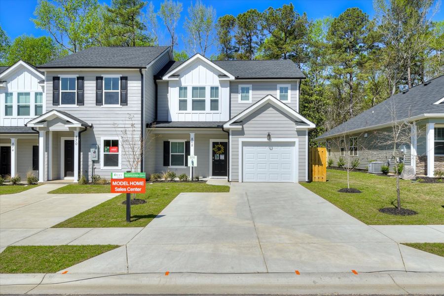 Front exterior of a new home in Forrest Bluff, North Augusta, SC, highlighting curb appeal (Image 14). Front exterior of a new home in Forrest Bluff, North Augusta, SC, highlighting curb appeal (Image 14).