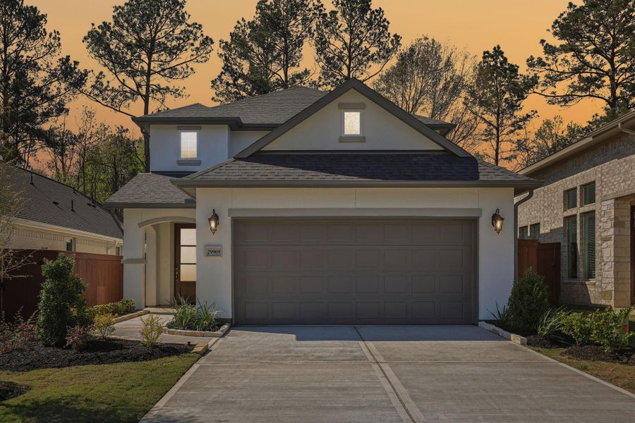 Front exterior of a new home in Woodhavyn 40', Magnolia, TX, highlighting curb appeal (Image 18). Front exterior of a new home in Woodhavyn 40', Magnolia, TX, highlighting curb appeal (Image 18).