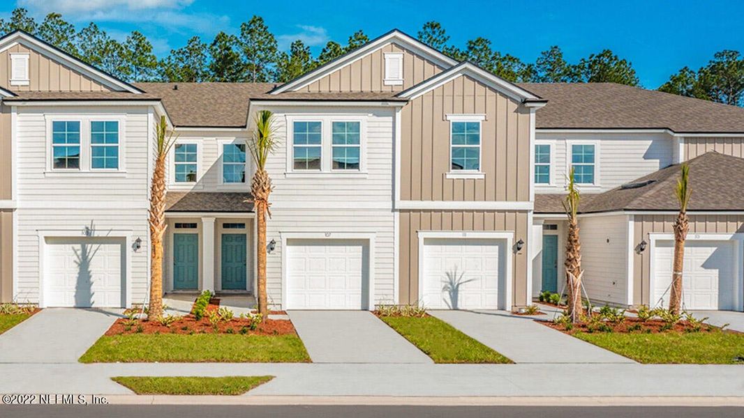 Front exterior of a new home in Bridgewater, St. Augustine, FL, highlighting curb appeal (Image 1). Front exterior of a new home in Bridgewater, St. Augustine, FL, highlighting curb appeal (Image 1).
