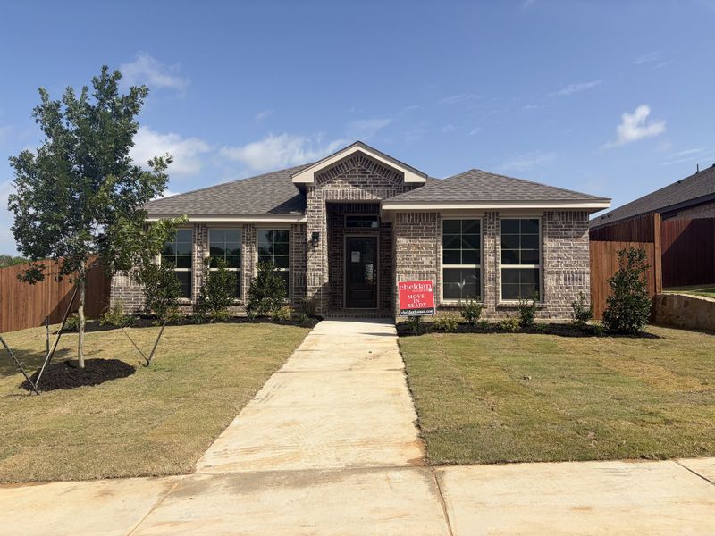 Front exterior of a new home in Trail Creek, Cleburne, TX, highlighting curb appeal (Image 1). Front exterior of a new home in Trail Creek, Cleburne, TX, highlighting curb appeal (Image 1).