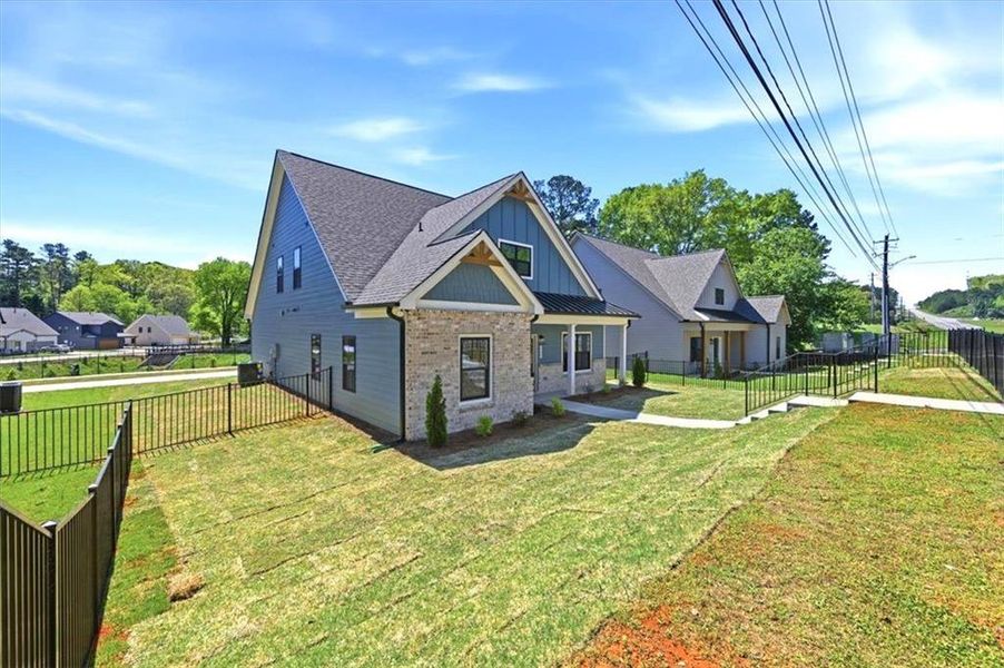 Exterior details and patio area of a home in Ferguson Corners, Emerson (Image 4).