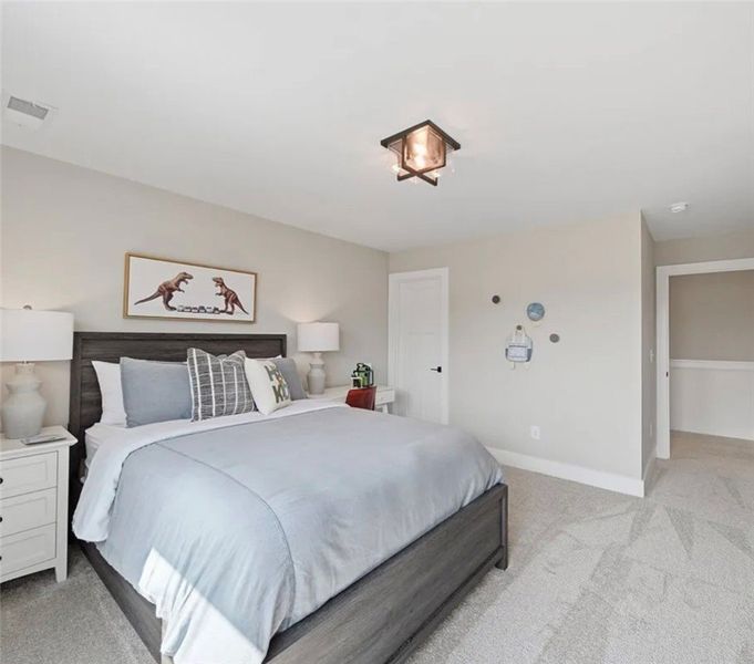 Comfortable bedroom retreat with plush carpeting a Comfortable bedroom retreat with plush carpeting a