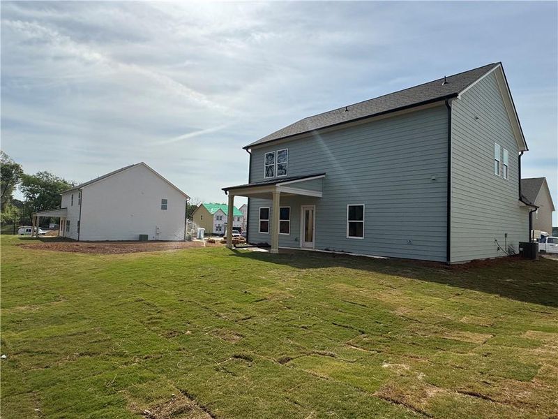 Exterior details and patio area of a home in Langston Reserve, Cartersville (Image 4). Exterior details and patio area of a home in Langston Reserve, Cartersville (Image 4).