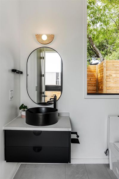 Bathroom featuring vanity and tile patterned flooring