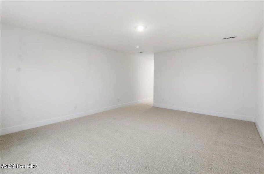 Spacious, unfurnished interior of a new home in Wood Creek Landing, Leland (Image 30).