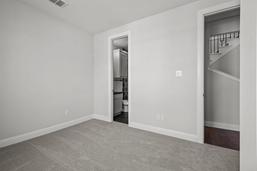 Representative unfurnished interior of a home built from the Bradley by Landon Homes in East Village - Classic Series, Frisco (Image 63). Representative unfurnished interior of a home built from the Bradley by Landon Homes in East Village - Classic Series, Frisco (Image 63).