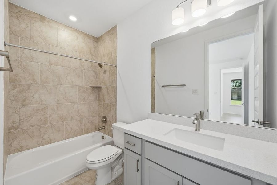 Furnished interior view inside a new home in Parkside on the River 60s, Georgetown (Image 15).