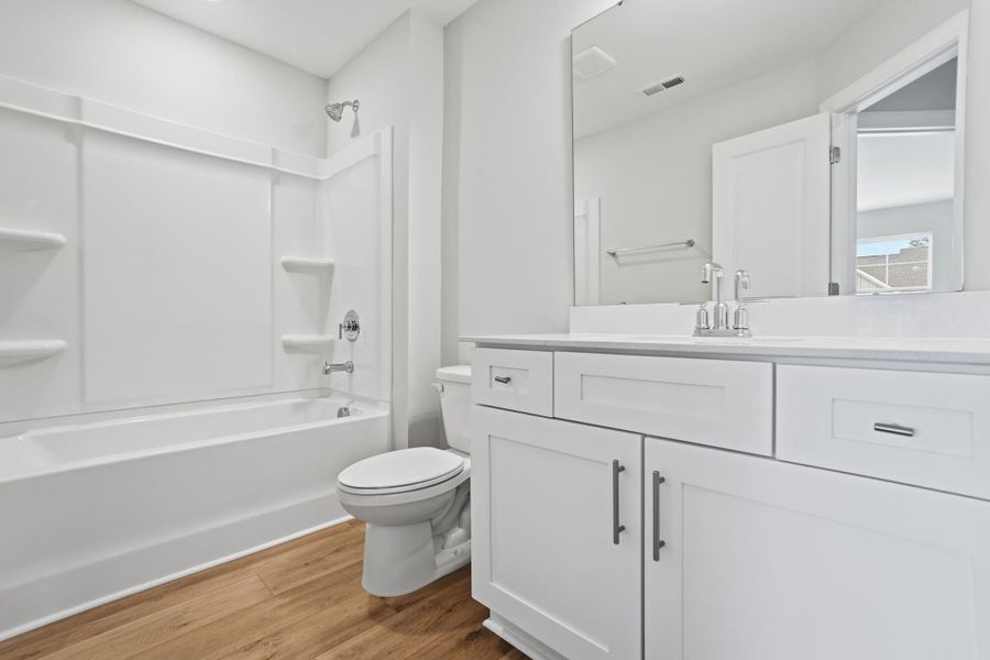 Furnished interior view inside a new home in Harrisburg Village Townhomes, Harrisburg (Image 17).