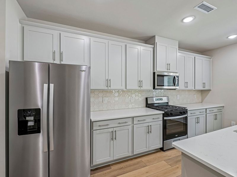 Furnished interior view inside a new home in Avalon Place - Signature Series, Durham (Image 4). Furnished interior view inside a new home in Avalon Place - Signature Series, Durham (Image 4).