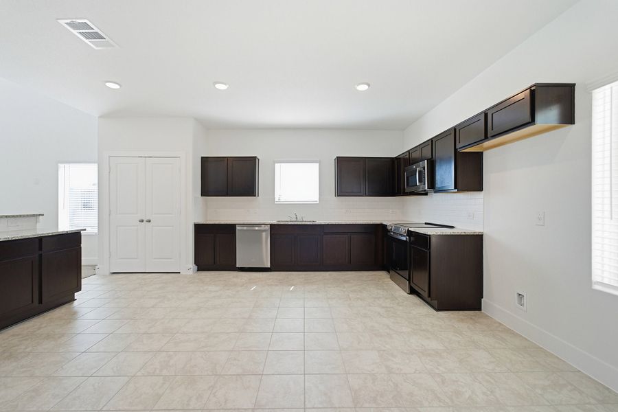Furnished interior view inside a new home in Grande Estates, Bertram (Image 8).