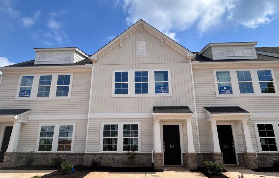 Front exterior of a new home in Edwards Station, Taylors, SC, highlighting curb appeal (Image 1). Front exterior of a new home in Edwards Station, Taylors, SC, highlighting curb appeal (Image 1).