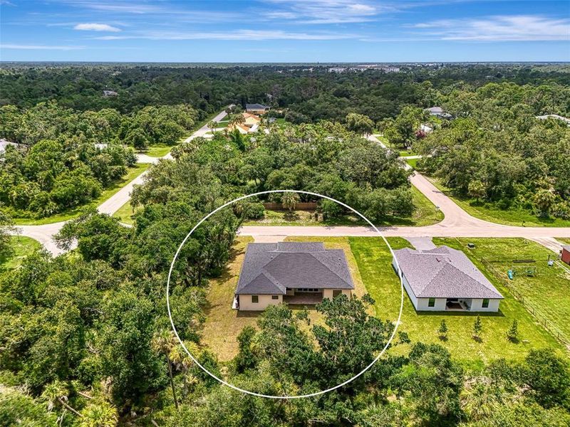 Front exterior of a new home in , Port Charlotte, FL, highlighting curb appeal (Image 1).