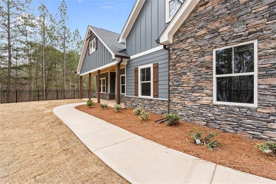 Exterior details and patio area of a home in , Villa Rica (Image 30).
