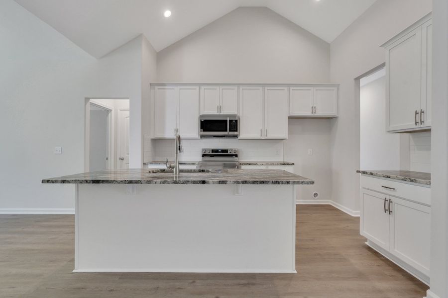 Furnished interior view inside a new home in McAllister Pointe, Richmond Hill (Image 9).