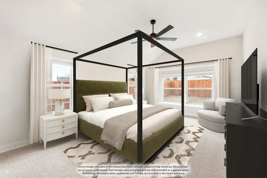 Master bedroom with four-poster bed, vaulted ceiling, ceiling fan, and multiple windows with natural light Master bedroom with four-poster bed, vaulted ceiling, ceiling fan, and multiple windows with natural light