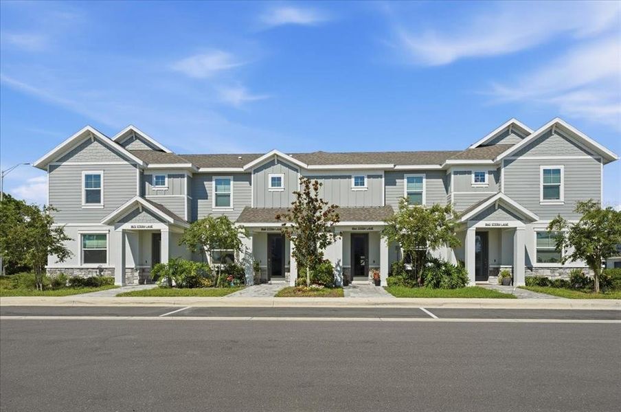 Front exterior of a new home in , Sarasota, FL, highlighting curb appeal (Image 27).
