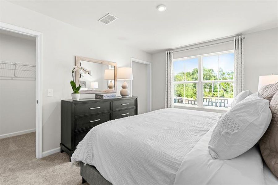 Representative furnished interior of a home built from the Reese by Ryan Homes in Middle Creek Village Coastal Cottages & Villas, Bolivia (Image 16).